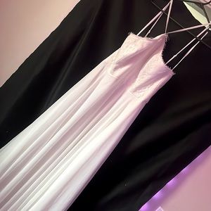 Romantic and timeless floor length wedding dress with lace detail